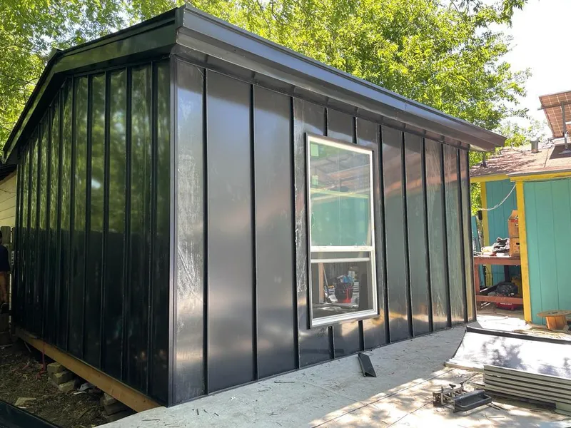Black standing seam metal wall panels for Metal Roof Installation in Oakhurst
